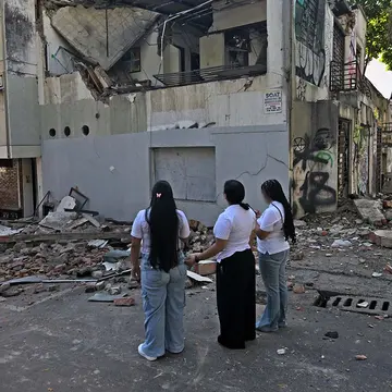 A child and family affected by the Colombia earthquake